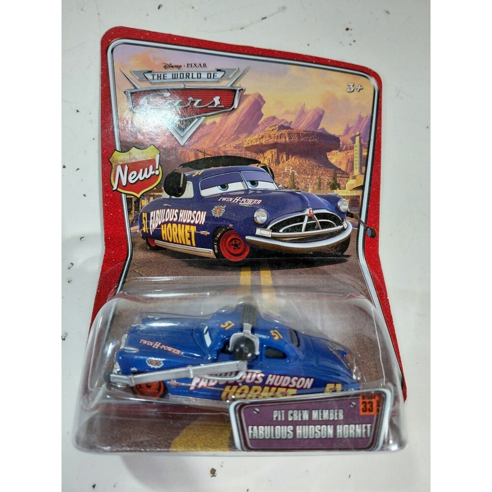 NIP Mattel 1:55 DieCast Disney World of Cars Pit Crew Fabulous Doc Hudson Hornet